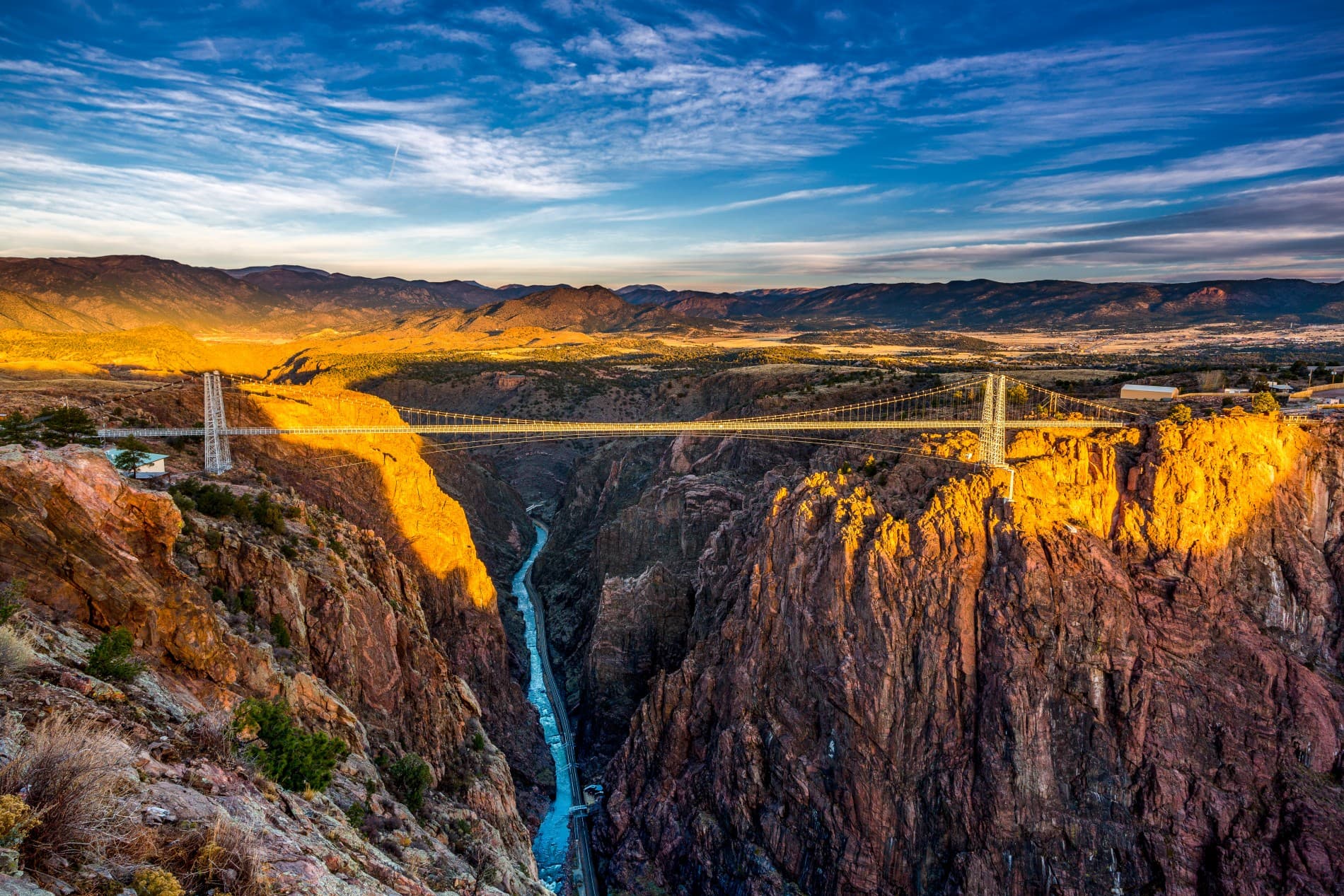Royal Gorge Bridge spanning 1,200-foot canyon with Sangre de Cristo mountains in background, Canon City Colorado tourism